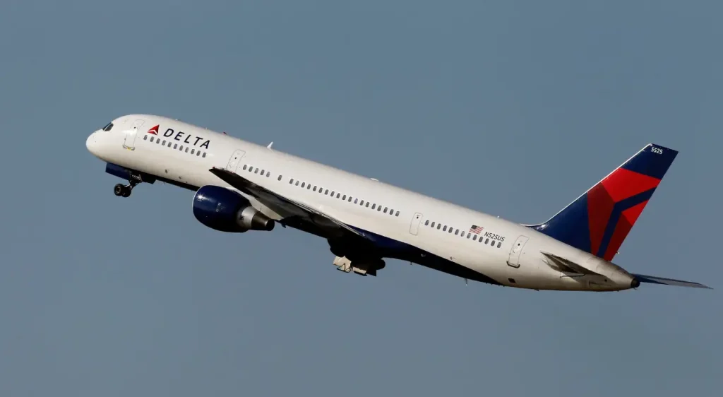 Delta aircraft taking off, representing departures from the Delta terminal at CDG Airport.